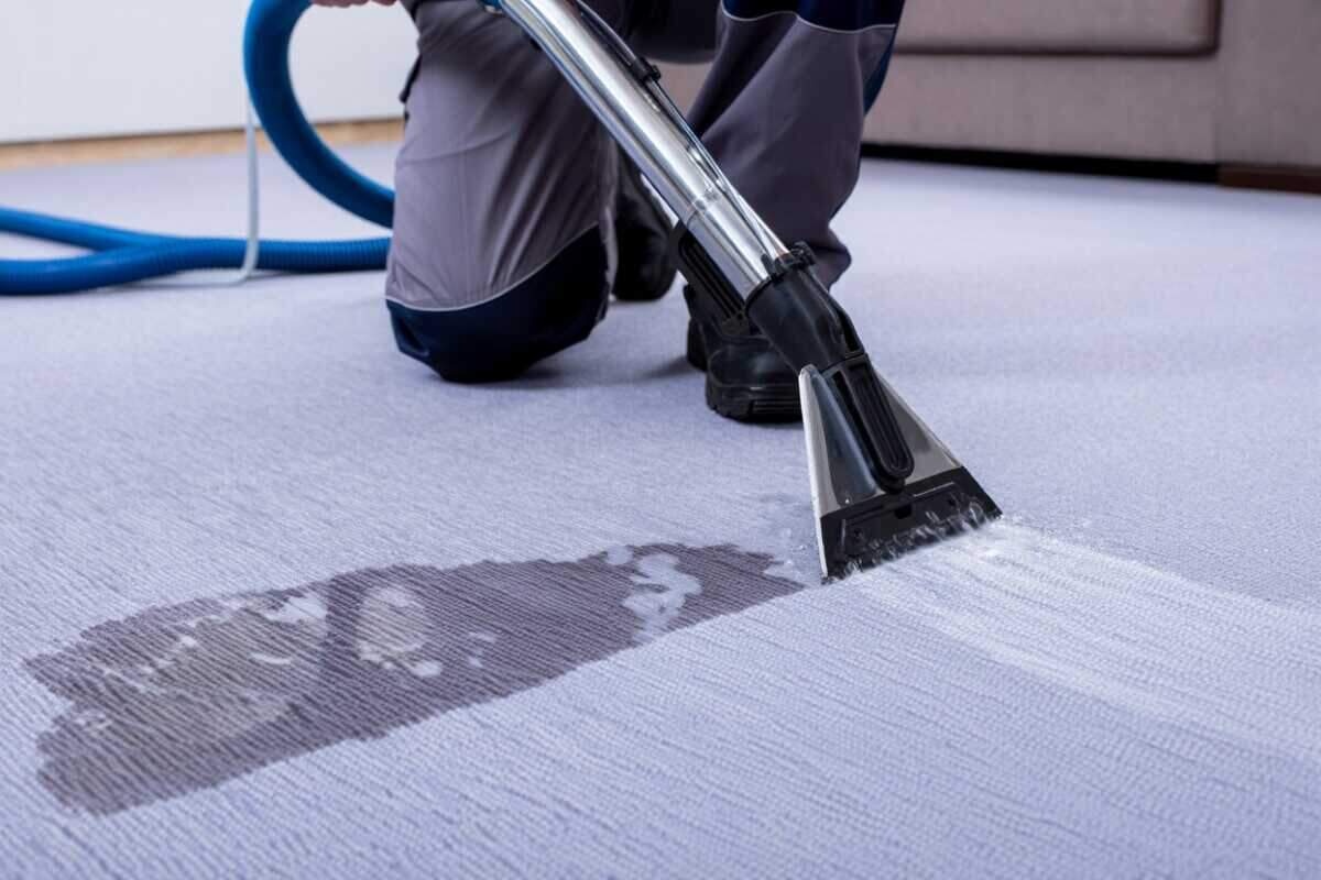 Water extraction from carpet in an Austin home