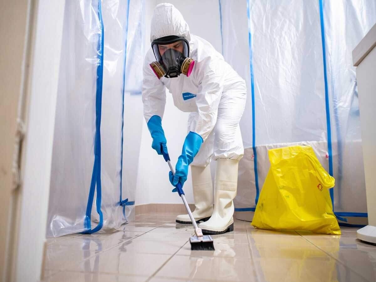Sewage cleanup under containment in an Austin home